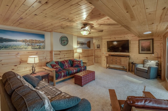 living room with wood ceiling, wooden walls, carpet flooring, and ceiling fan