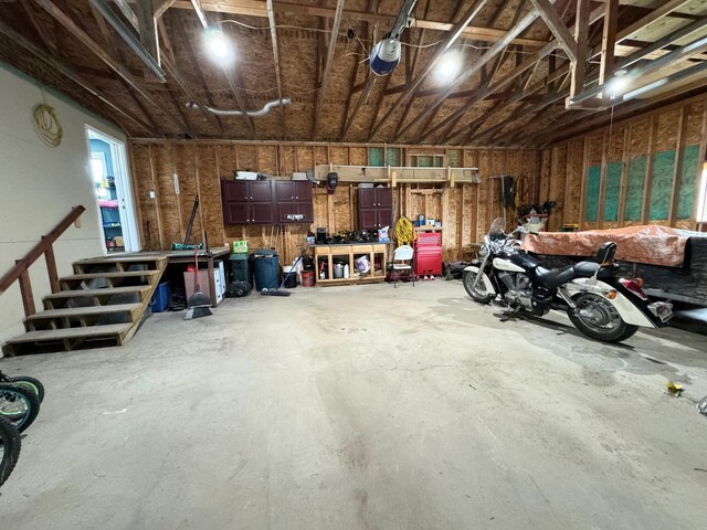 garage with a workshop area