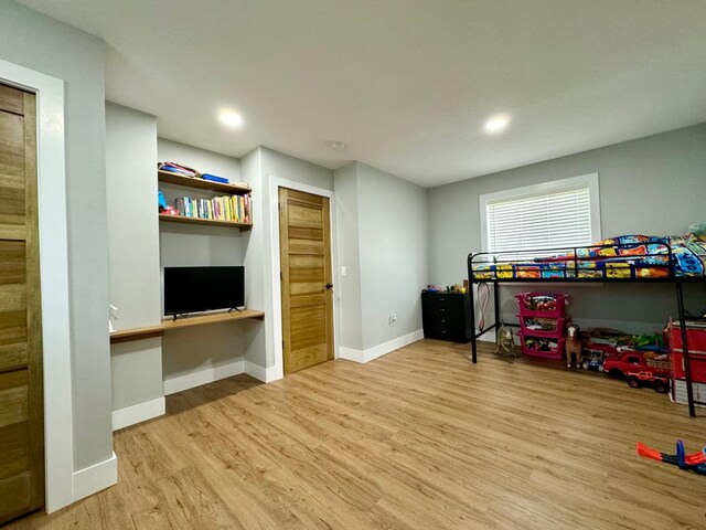 recreation room featuring light hardwood / wood-style floors