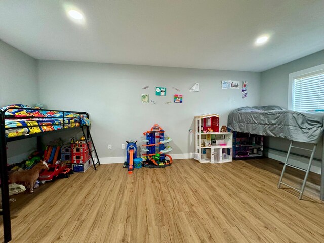 bedroom featuring light hardwood / wood-style flooring