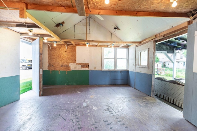 interior space featuring vaulted ceiling