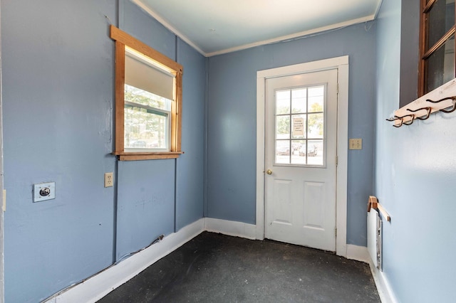 doorway featuring ornamental molding