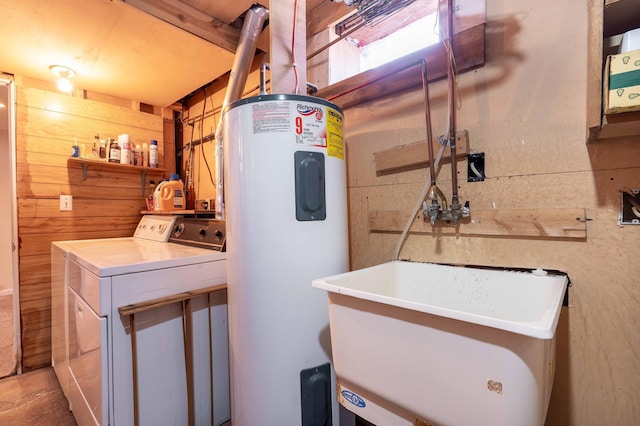 utilities with water heater and washing machine and dryer