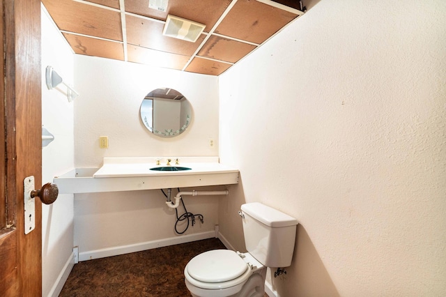 bathroom with sink and toilet