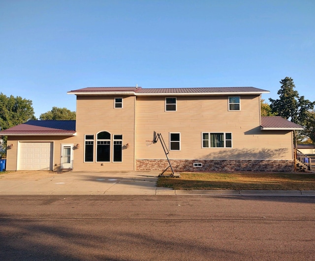 view of front of home with a garage