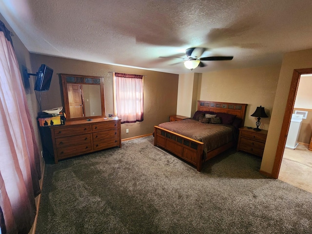 carpeted bedroom with a textured ceiling and ceiling fan