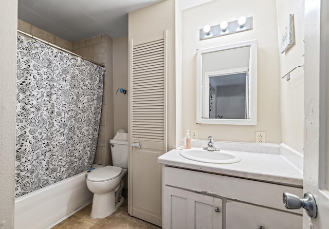 full bathroom featuring shower / tub combo with curtain, tile patterned flooring, vanity, and toilet