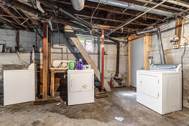 basement featuring washing machine and dryer