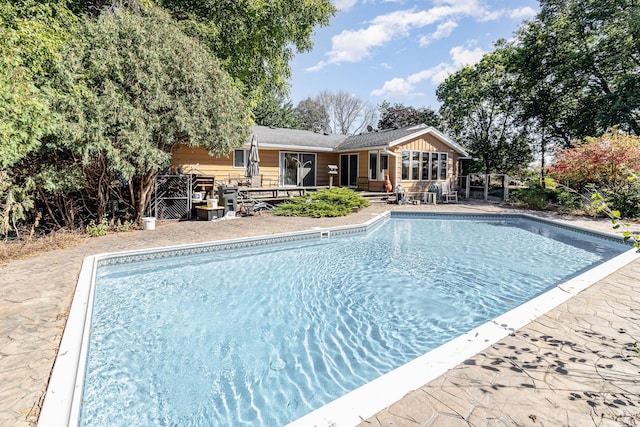 view of pool featuring a patio area