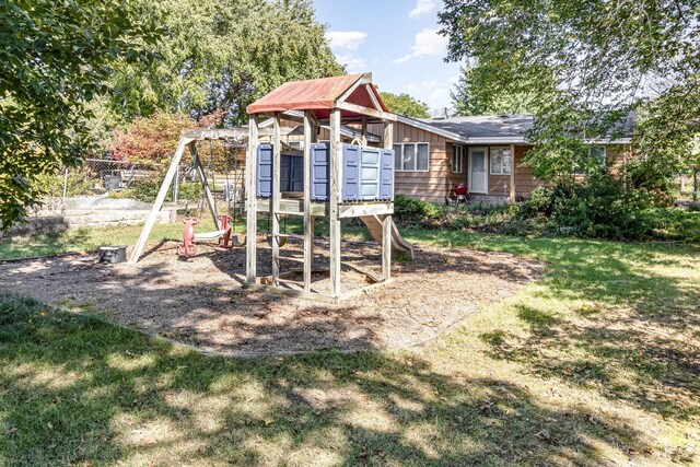 view of playground with a yard