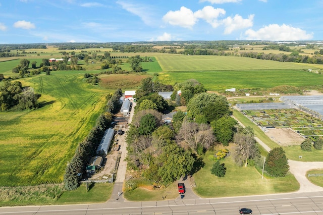 birds eye view of property featuring a rural view