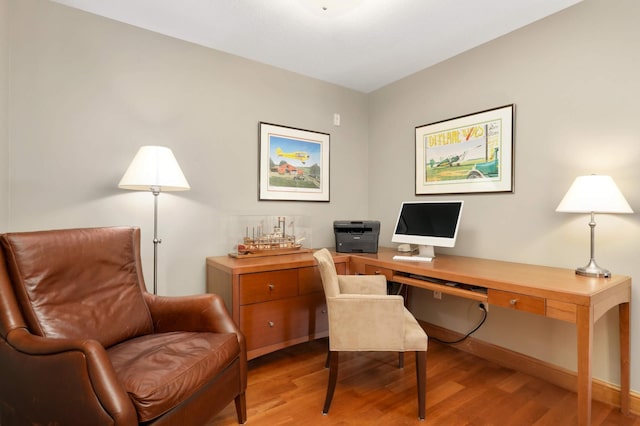 office area with light wood-type flooring