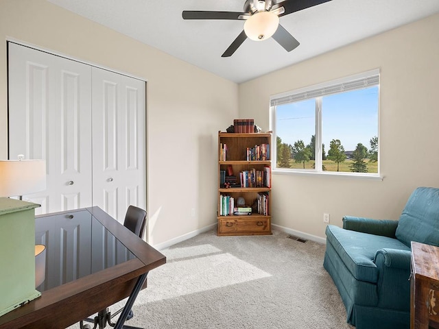 office area featuring carpet and ceiling fan