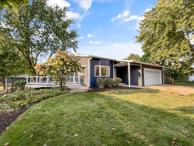 ranch-style house with a front yard and a garage