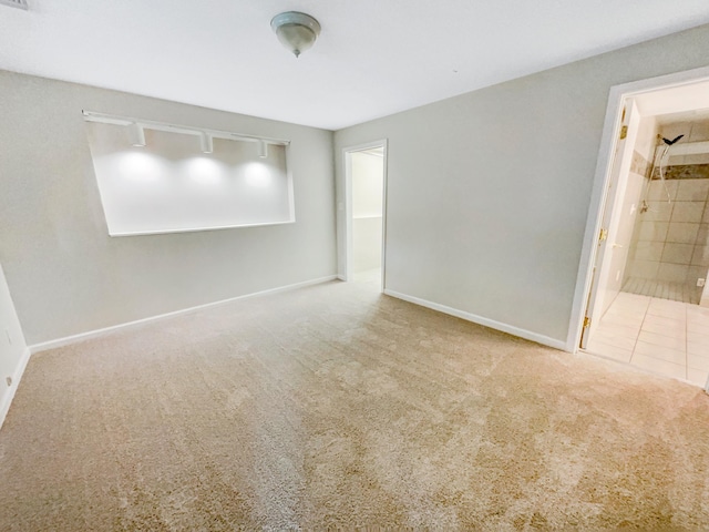 unfurnished room with carpet