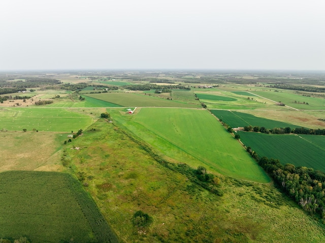 birds eye view of property featuring a rural view