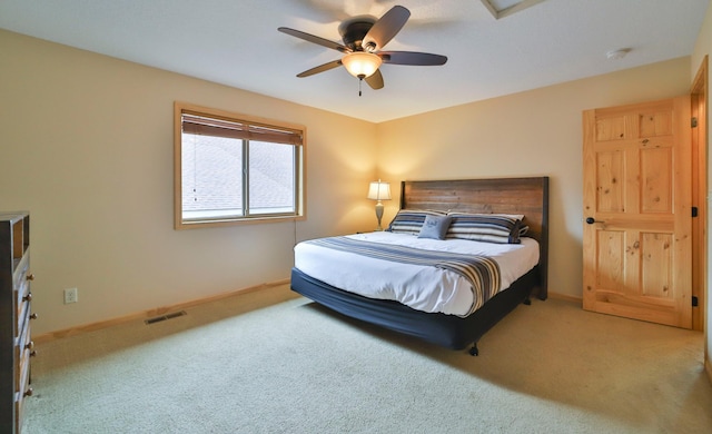 bedroom with ceiling fan and carpet floors