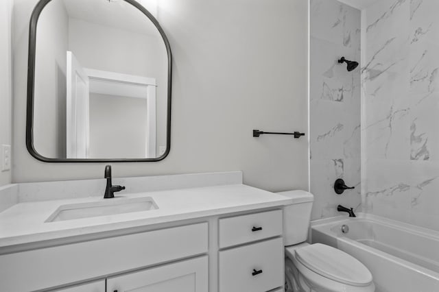 full bathroom with tiled shower / bath combo, vanity, and toilet