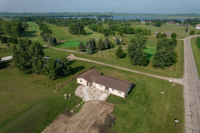 drone / aerial view featuring a water view and a rural view