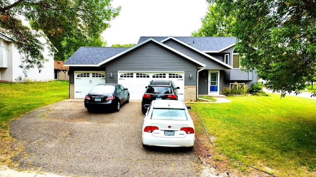 view of front facade featuring a front lawn and a garage