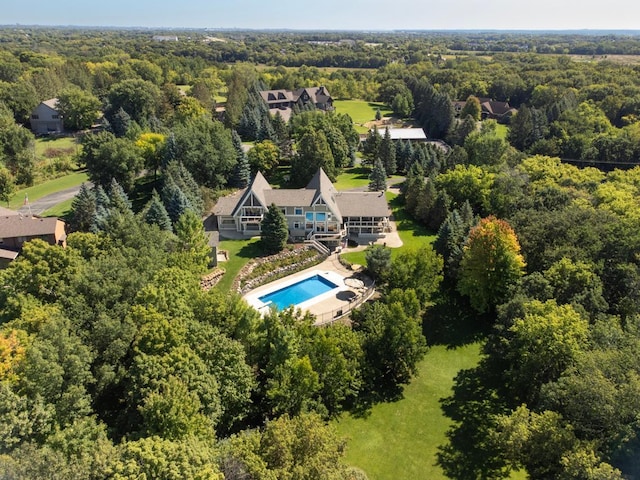 8800 Sunset Trl, Chanhassen, MN 55317 - bird's eye view of a pool area and a heavily wooded area