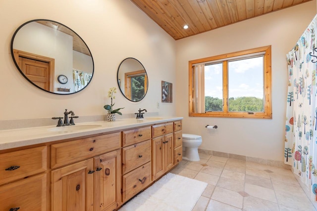 8800 Sunset Trl, Chanhassen, MN 55317 - full bath featuring wood ceiling, double vanity, baseboards, toilet, and tile patterned floors