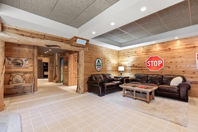 8800 Sunset Trl, Chanhassen, MN 55317 - living area with recessed lighting, wood walls, light tile patterned flooring, and a raised ceiling