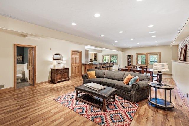 8800 Sunset Trl, Chanhassen, MN 55317 - living room with light wood-type flooring, recessed lighting, and baseboards