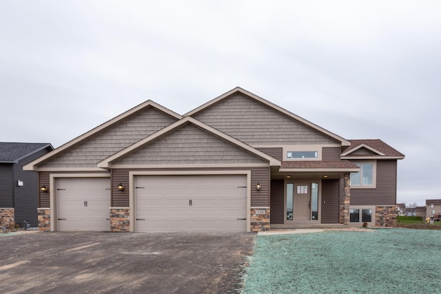 craftsman-style house featuring a garage