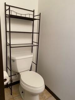 bathroom featuring tile patterned floors and toilet