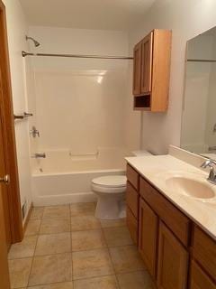 full bathroom with vanity, tile patterned flooring, shower / bathing tub combination, and toilet