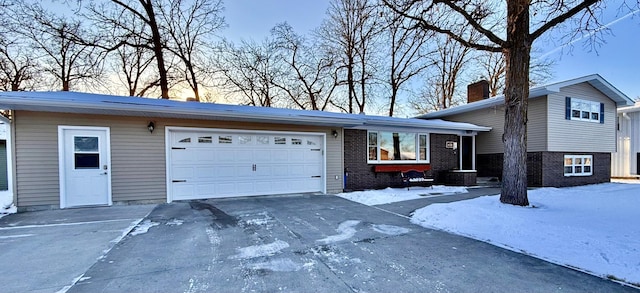 view of front of home with a garage