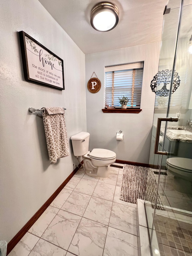 bathroom with toilet and walk in shower