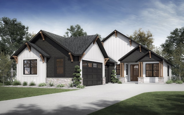 view of front of house with a front lawn, stone siding, roof with shingles, board and batten siding, and an attached garage