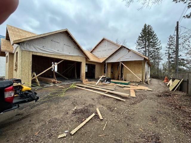 property under construction with an outbuilding and a garage