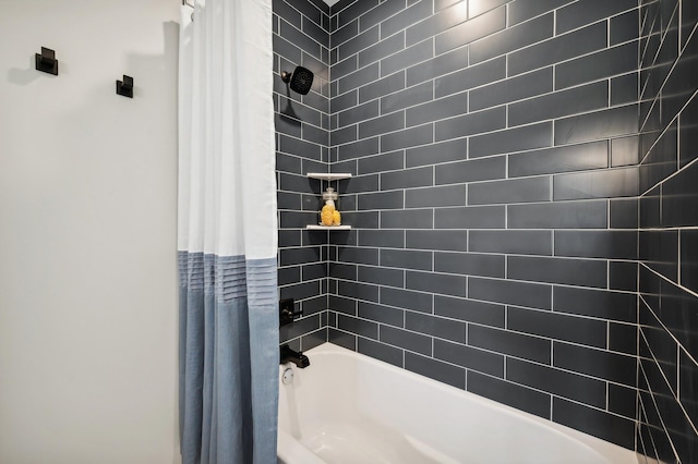 bathroom with shower / bath combination with curtain