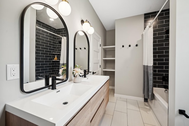 bathroom with tile patterned flooring, shower / bath combination with curtain, and vanity