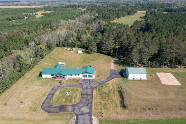 birds eye view of property with a rural view