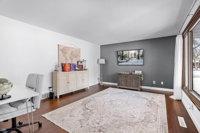 office space featuring dark wood-type flooring