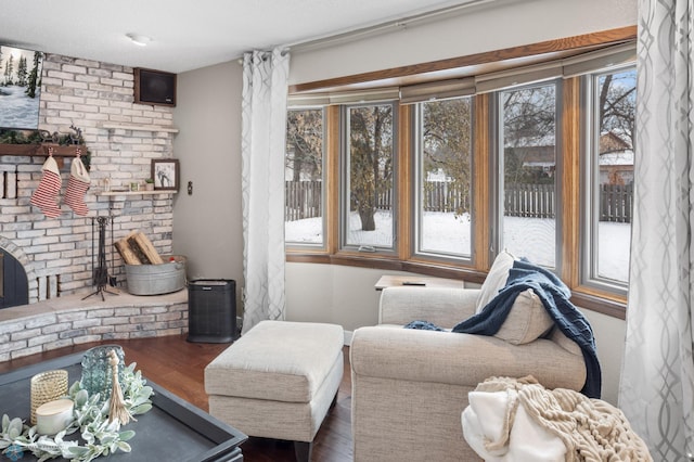 living area featuring dark hardwood / wood-style flooring and a textured ceiling