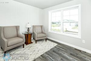 living area with wood-type flooring