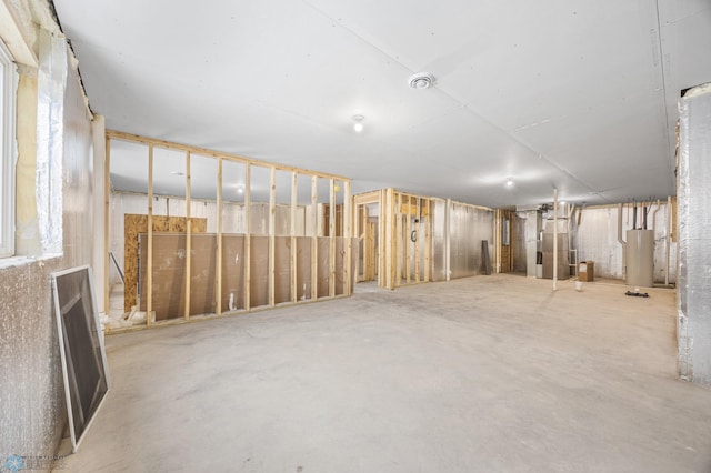 unfinished below grade area with water heater and heating unit