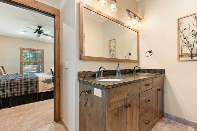 bathroom featuring vanity and ceiling fan