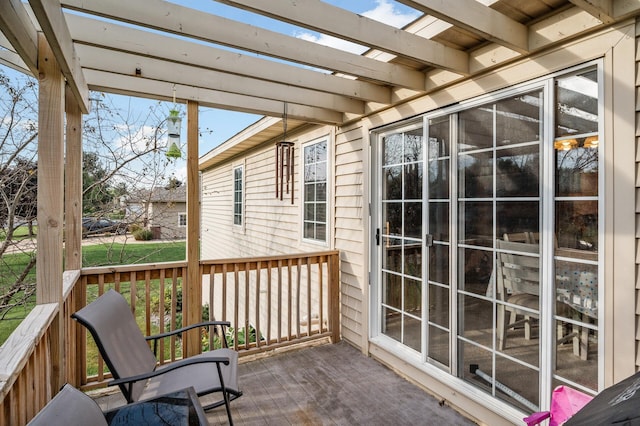 exterior space featuring a deck and a pergola