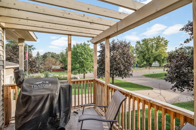 exterior space featuring a pergola and a grill