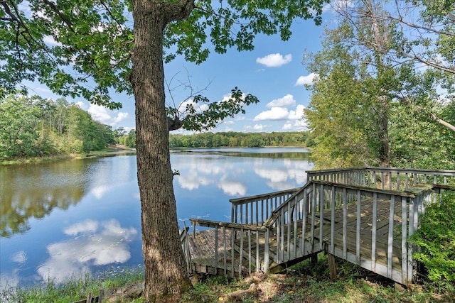 exterior space with a water view