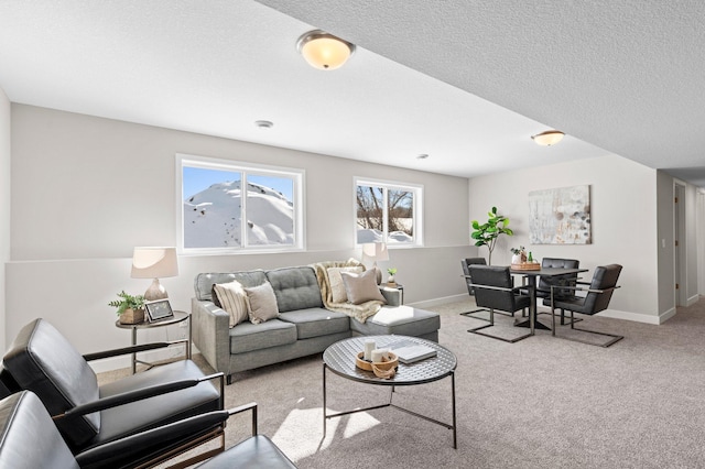 carpeted living room with a textured ceiling