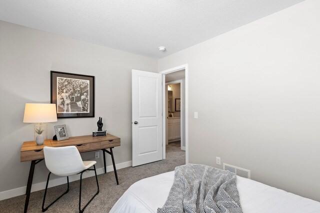 bedroom featuring light carpet