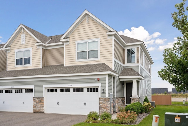 view of front of property featuring a garage