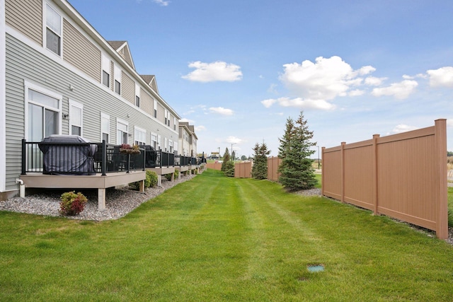 view of yard featuring a deck